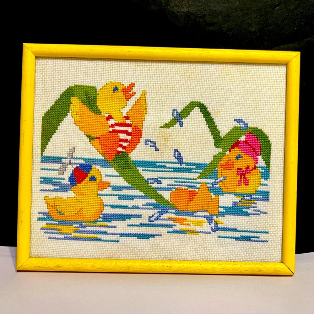 Vtg baby ducks needlepoint in yellow frame, playing in water